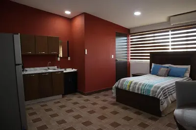 Cama o camas de una habitación en Departamentos Bonsai