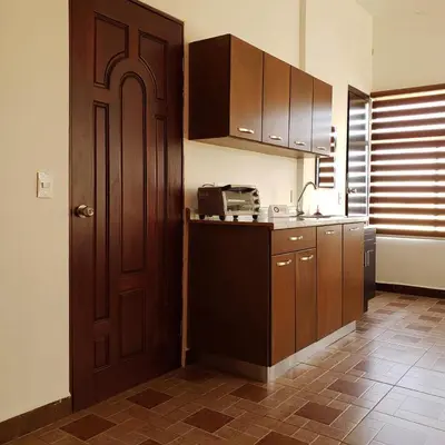Una cocina o zona de cocina en Departamentos Bonsai