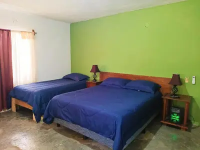 Cama o camas de una habitación en Casa Las Margaritas