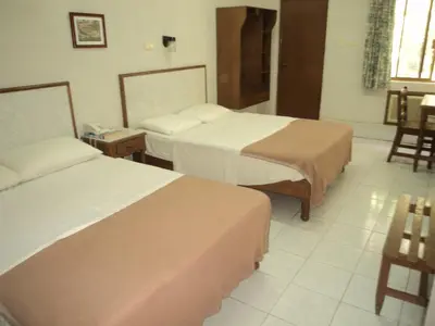 Cama o camas de una habitación en Hotel Kuraica