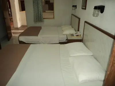 Cama o camas de una habitación en Hotel Kuraica