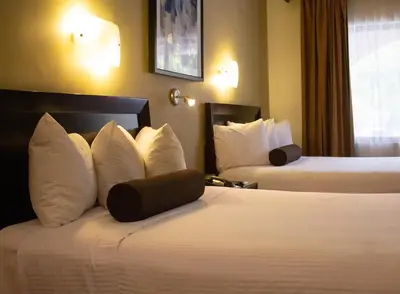 Cama o camas de una habitación en Hotel Del Rio