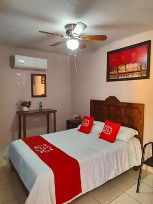Cama o camas de una habitación en Hotel Posada Santa Elena