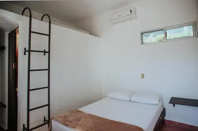 Cama o camas de una habitación en La Posada en el Potrero Chico