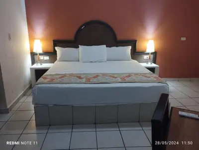 Cama o camas de una habitación en Hotel Hacienda Nainari