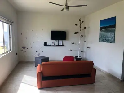 Una televisión o centro de entretenimiento en Terra Viva Villa Campestre Y Residencia El Encino