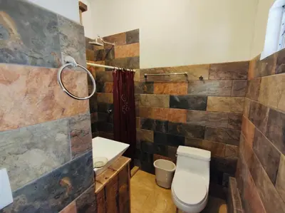 Un baño de Hotel Villa de Urike