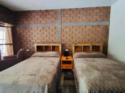 Cama o camas de una habitación en Hotel Villa de Urike