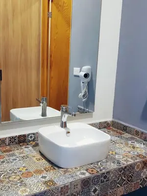 Un baño de HOTEL PLAZA MATAMOROS