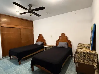 Cama o camas de una habitación en Acogedora habitación en excelente ubicación