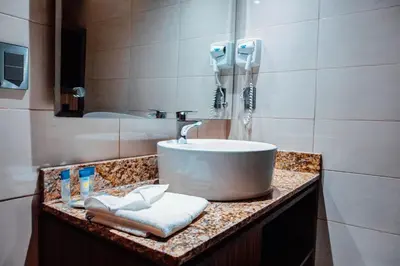 Un baño de KAVIA MEOQUI HOTEL & SUITES