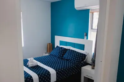 Cama o camas de una habitación en Punta Esmeralda I