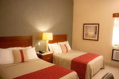 Cama o camas de una habitación en Hotel Fenix