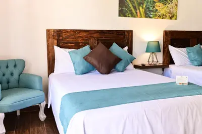 Cama o camas de una habitación en Hacienda Viga 2020 Hotel