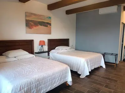 Cama o camas de una habitación en Hacienda Viga 2020 Hotel