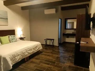 Cama o camas de una habitación en Hacienda Viga 2020 Hotel