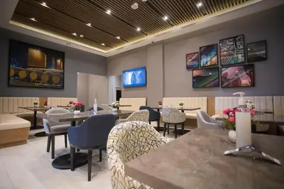 Una televisión o centro de entretenimiento en Hyatt Place Saltillo