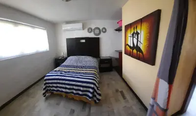 Cama o camas de una habitación en Villa Quintas Del Mar