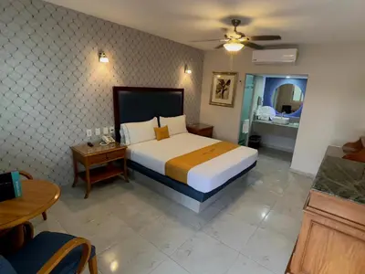 Cama o camas de una habitación en Hotel Maioris Bellavista