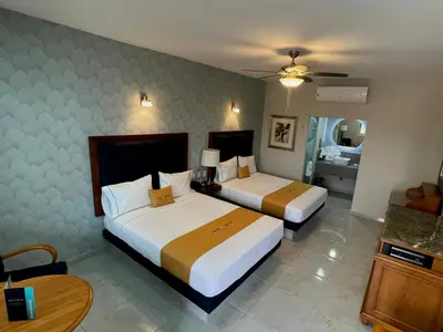 Cama o camas de una habitación en Hotel Maioris Bellavista
