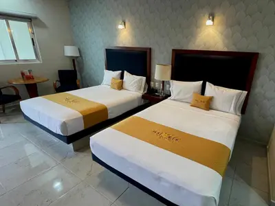 Cama o camas de una habitación en Hotel Maioris Bellavista