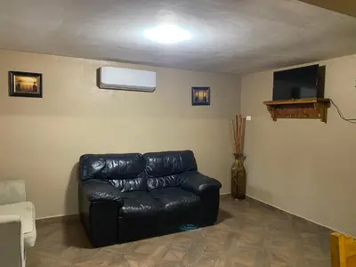 Zona de estar de Cabaña el Pino 1