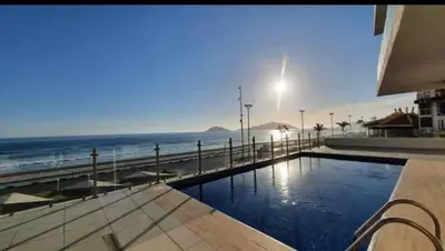 Piscina en o cerca de Departamento en malecon Portico Beach