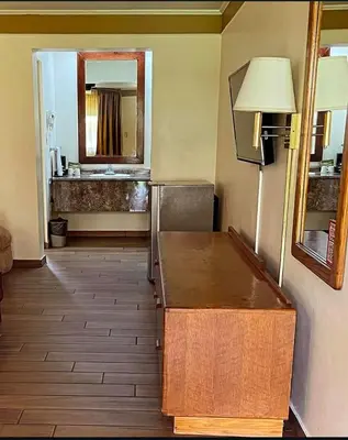 Cama o camas de una habitación en Hotel Santa Fe