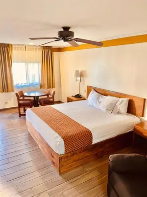 Cama o camas de una habitación en Hotel Santa Fe