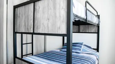 Cama o camas de una habitación en CASA FAMILIAR PARA 8 PERSONAS EN RESIDENCIAL SEGURO