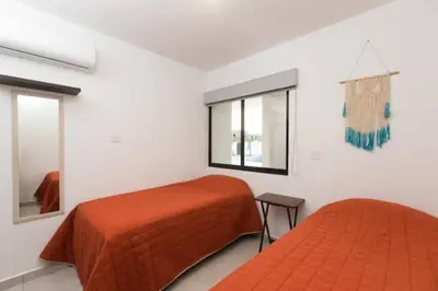 Cama o camas de una habitación en DEPARTAMENTO EN PLANTA BAJA CON TERRAZA