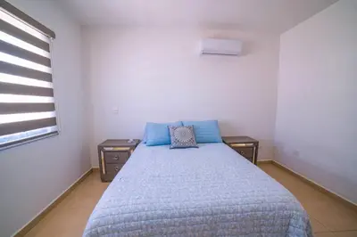 Cama o camas de una habitación en CASA VACACIONAL PERFECTA PARA TU FAMILIA!