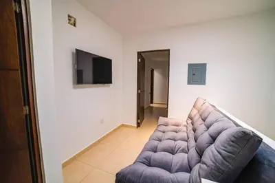 Una televisión o centro de entretenimiento en CASA VACACIONAL PERFECTA PARA TU FAMILIA!