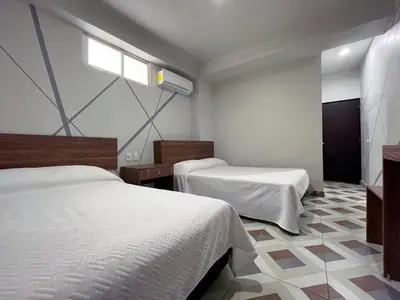 Cama o camas de una habitación en Hotel Town Express