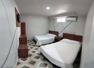 Cama o camas de una habitación en Hotel Town Express