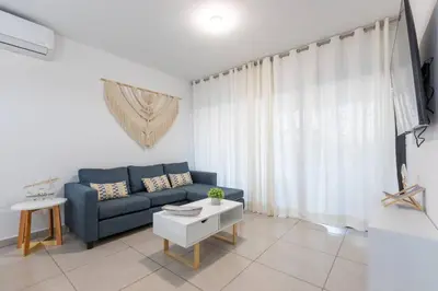 Una televisión o centro de entretenimiento en Departamento nuevo en PLANTA BAJA