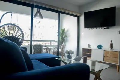 Una televisión o centro de entretenimiento en Departamento familiar en Mazatlán