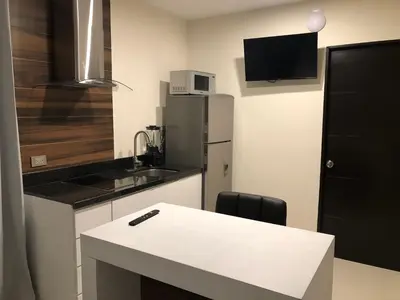 Una cocina o zona de cocina en Suites Rubí - Las Mejores vistas de San Carlos
