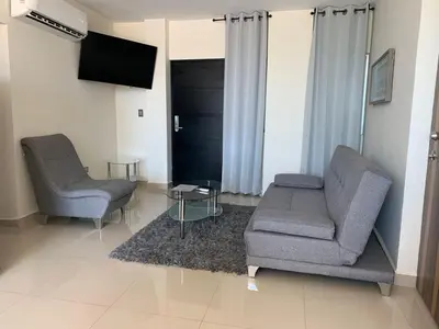 Zona de estar de Suites Rubí - Las Mejores vistas de San Carlos