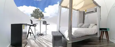 Cama o camas de una habitación en Wooden Inn - Cabañas Boutique y Bubble Glamping en Creel