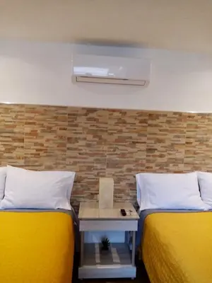 Cama o camas de una habitación en HOTEL COLIBRÍ