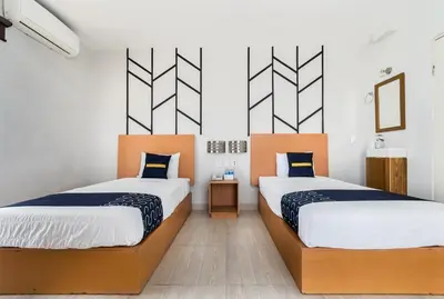 Cama o camas de una habitación en Hotel Plaza Regina Torreon
