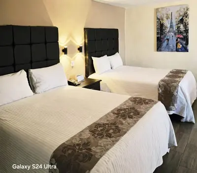 Cama o camas de una habitación en Hotel Express Inn