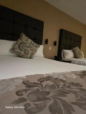 Cama o camas de una habitación en Hotel Express Inn