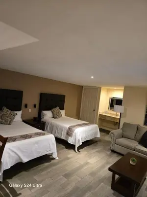 Cama o camas de una habitación en Hotel Express Inn