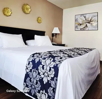 Cama o camas de una habitación en Hotel Express Inn