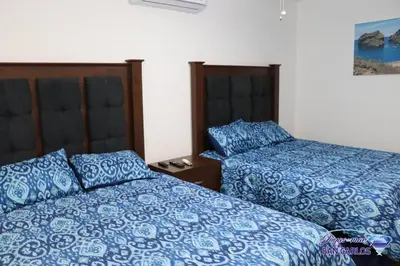 Cama o camas de una habitación en Departamento Turquesa 1 Joyas del mar San Carlos