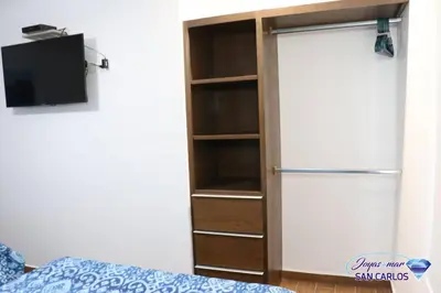 Cama o camas de una habitación en Departamento Turquesa 1 Joyas del mar San Carlos