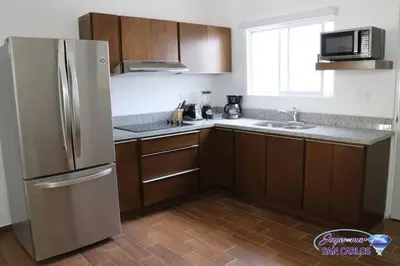 Una cocina o zona de cocina en Departamento Turquesa 2 Joyas del Mar