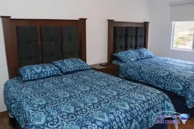 Cama o camas de una habitación en Departamento Turquesa 4 Joyas de San Carlos